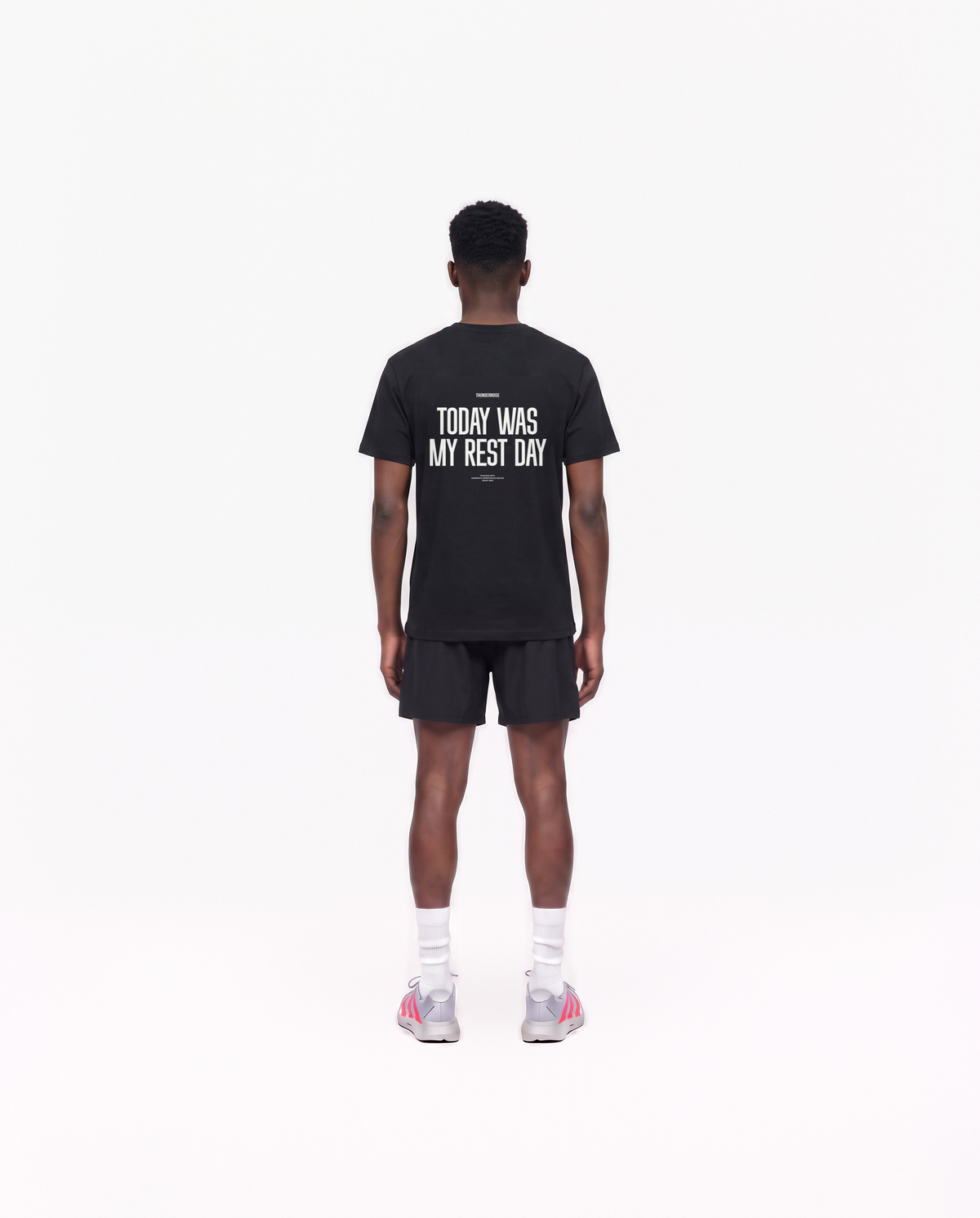 Model wearing the Today Was My Rest Day t-shirt in black — back view with the TODAY WAS MY REST DAY block in white — View 4