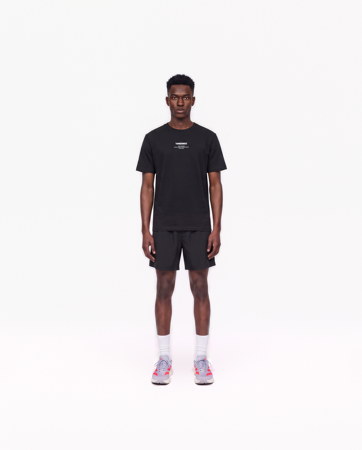Model wearing the Today Was My Rest Day t-shirt in black — front view with the compact Thundernoise chest mark in white — View 2
