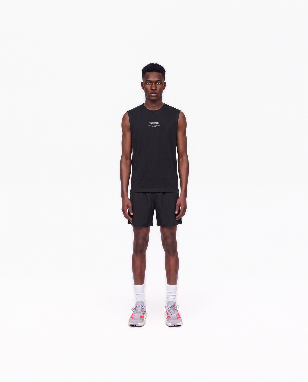 Model wearing the Today Was My Rest Day tank top in black — front view with the compact Thundernoise chest mark in white — View 2