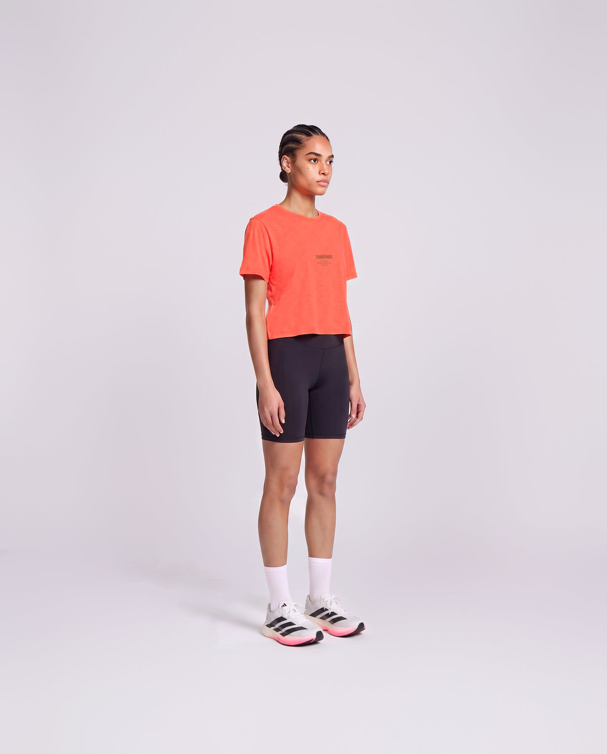 Training Dept. triblend cropped t-shirt in coral on model — three-quarter view — View 3