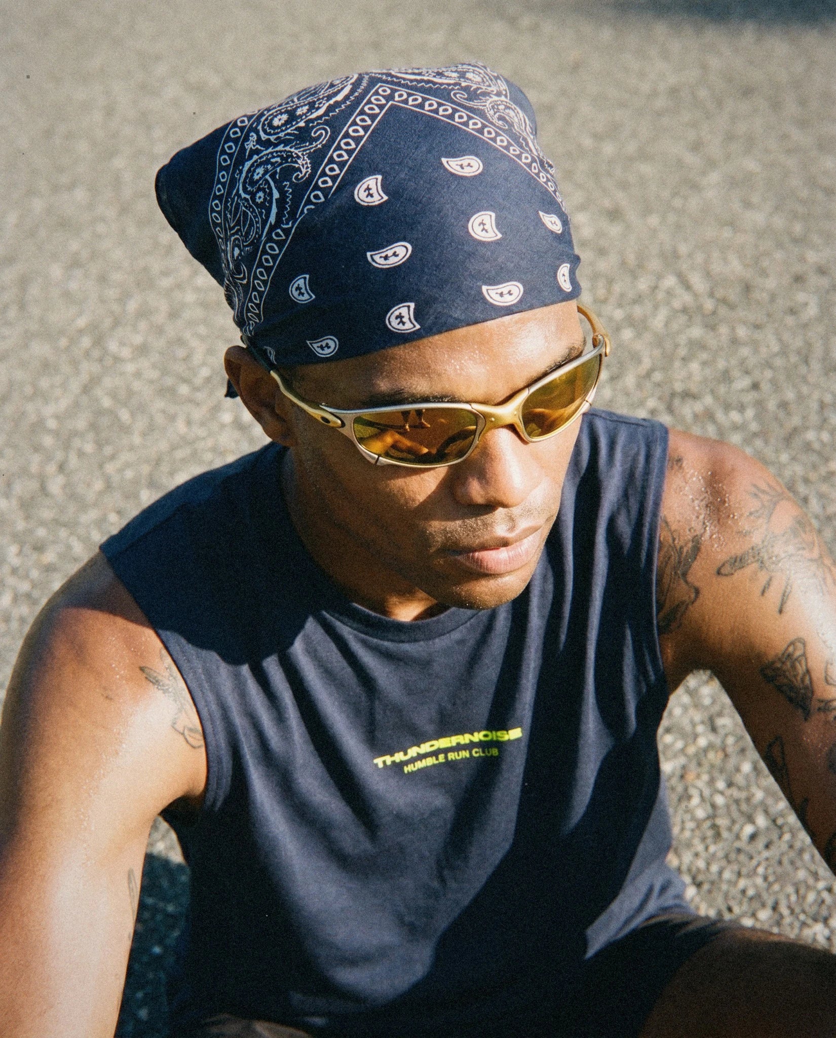 Runner wearing a Thundernoise Less Ego More Miles tank