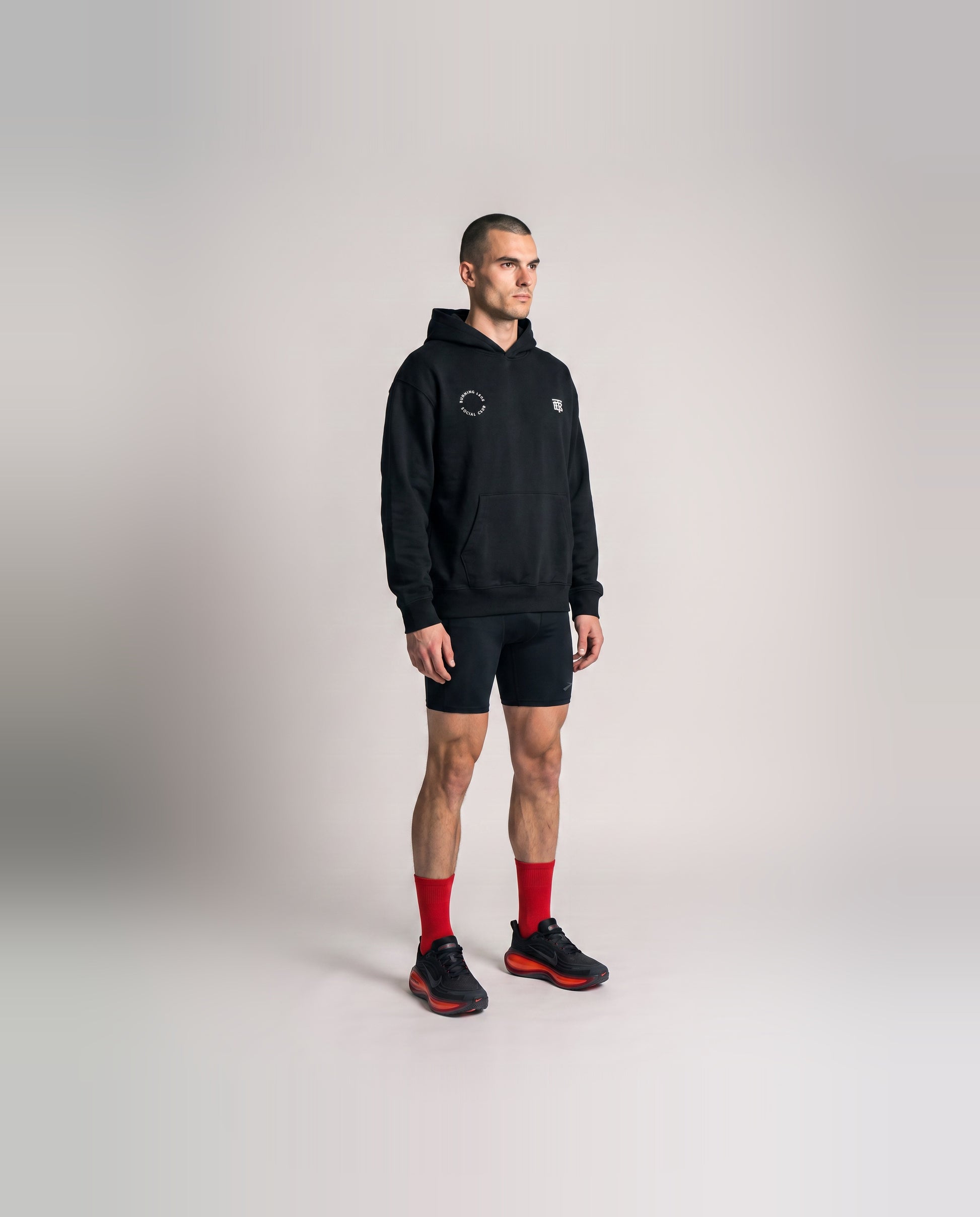 Burning Legs Social Club Oversize Hoodie Black — model three quarter