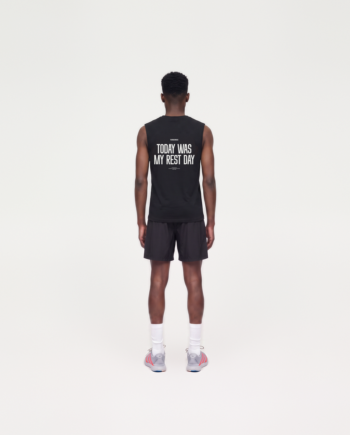 Model wearing the Today Was My Rest Day tank top in black — back view with the TODAY WAS MY REST DAY block in white — View 4
