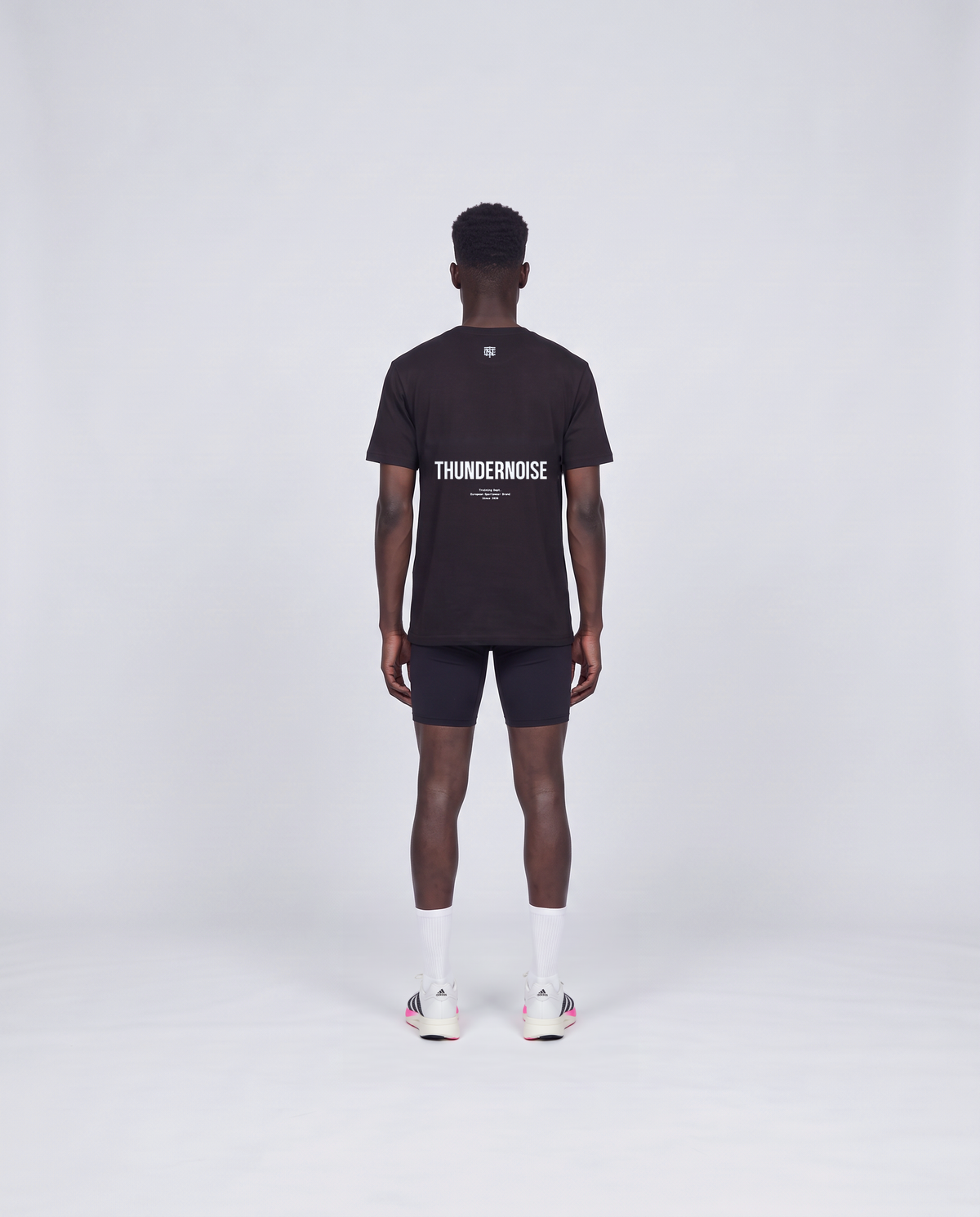Training Dept. triblend t-shirt in black on model — back view — View 4
