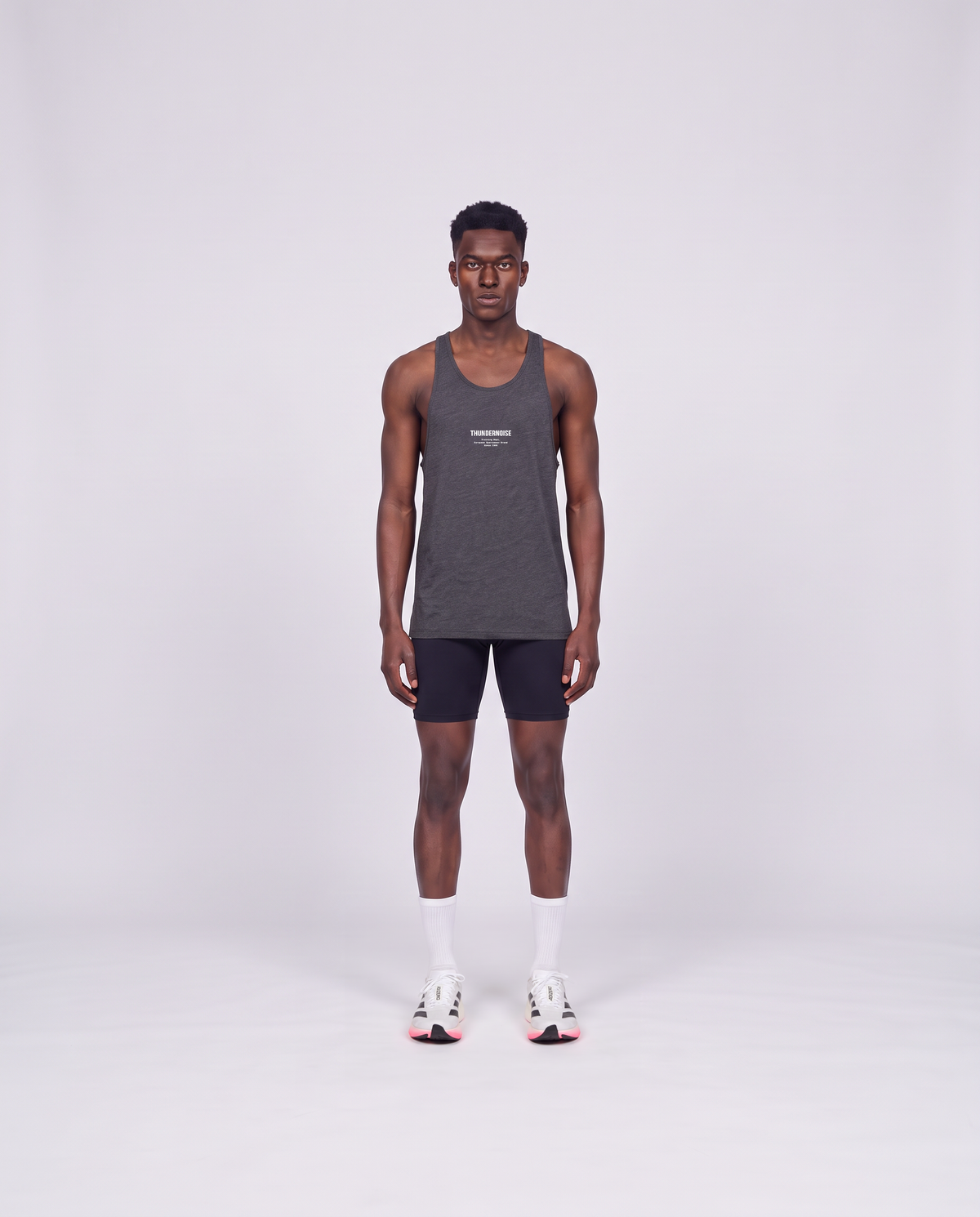 Training Dept. triblend tank top in dark grey heather on model — front view — View 2
