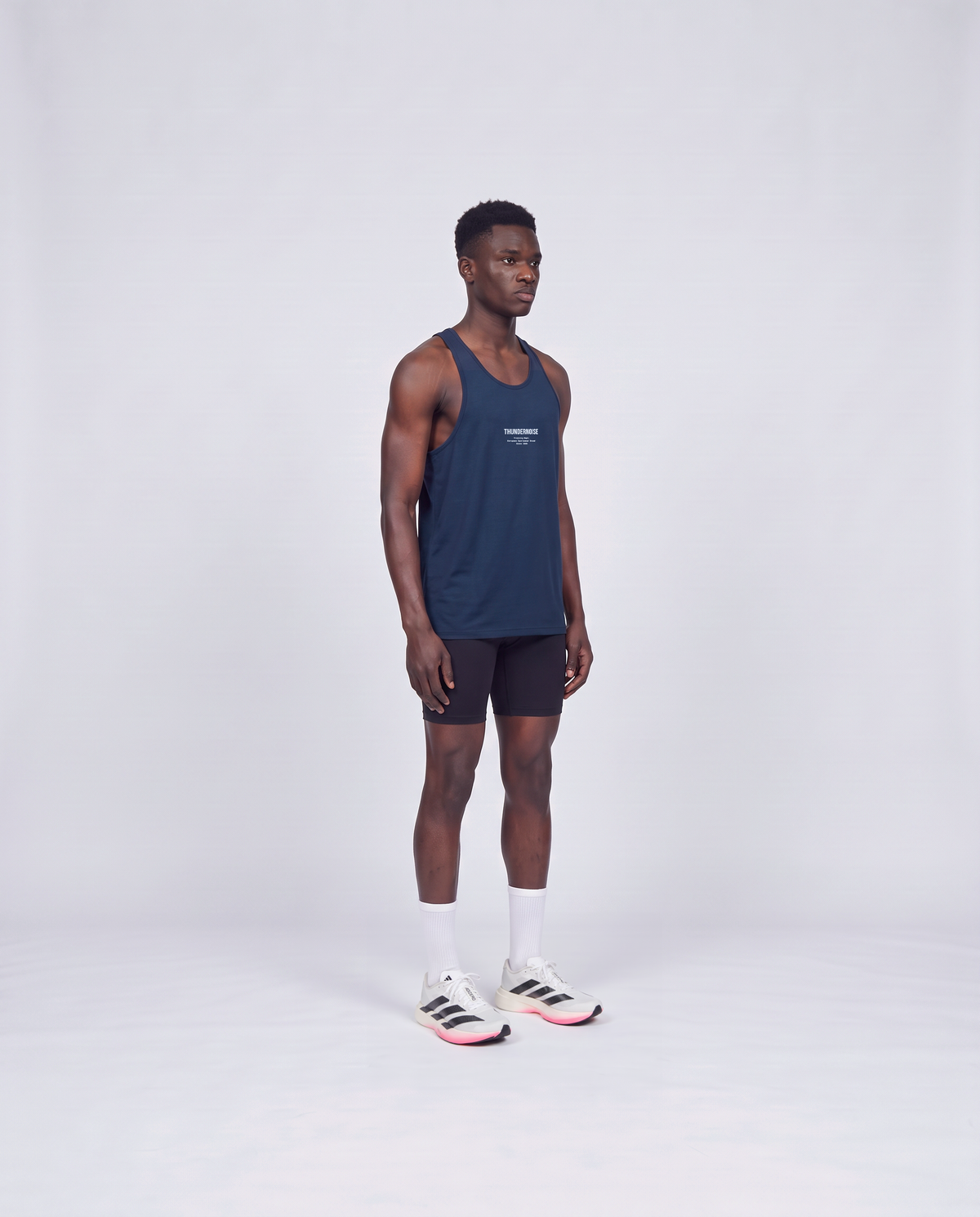Training Dept. triblend tank top in french navy heather on model — three-quarter view — View 3

