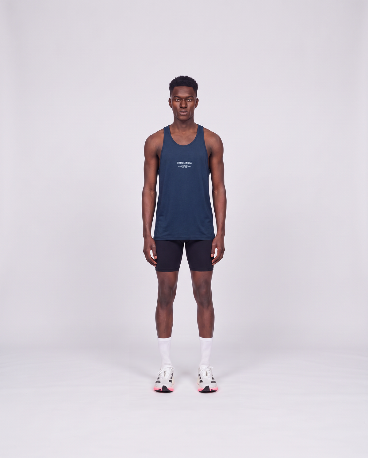 Training Dept. triblend tank top in french navy heather on model — front view — View 2
